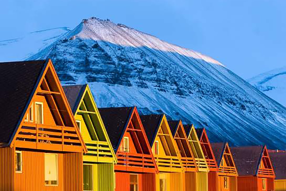 2-Ultimate-Journey-Yacht-Section-PJ-Yacht-3-Page-Carousel-Svalbard-Norway-Coloured-Buildings-Private-Journey-Arctic-Polar-Adventure-Arctic-Kingdom